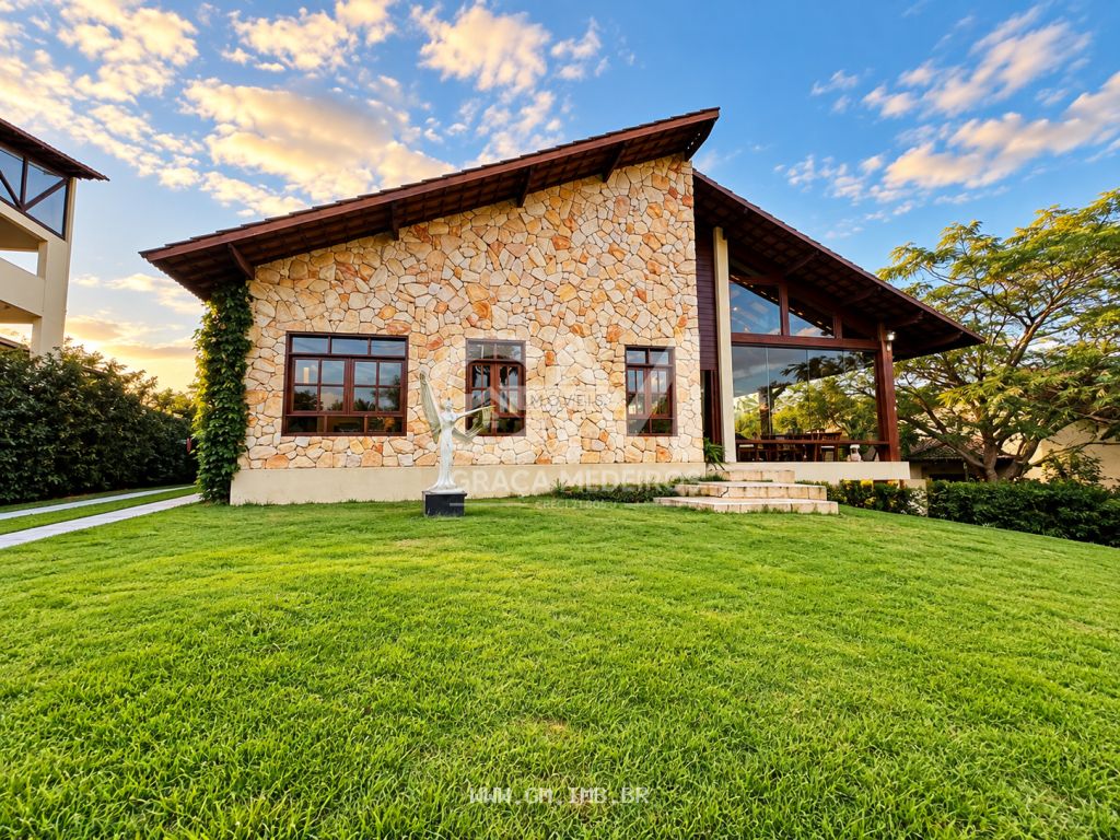 Foto de Casa de alto padrão em condomínio estilo fazenda