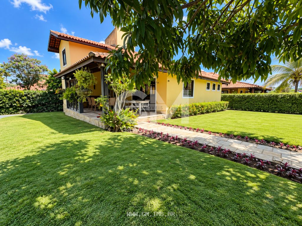 Casa com 4 suítes, mobiliada, terreno com 450 m² 
