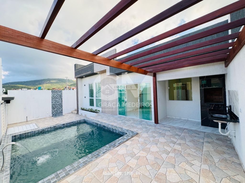 Foto de Casa com piscina com espaço gourmet