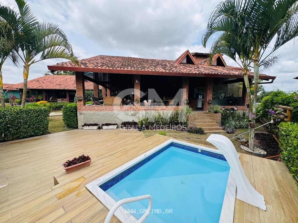 Foto de Casa com 7 quartos em condomínio fechado