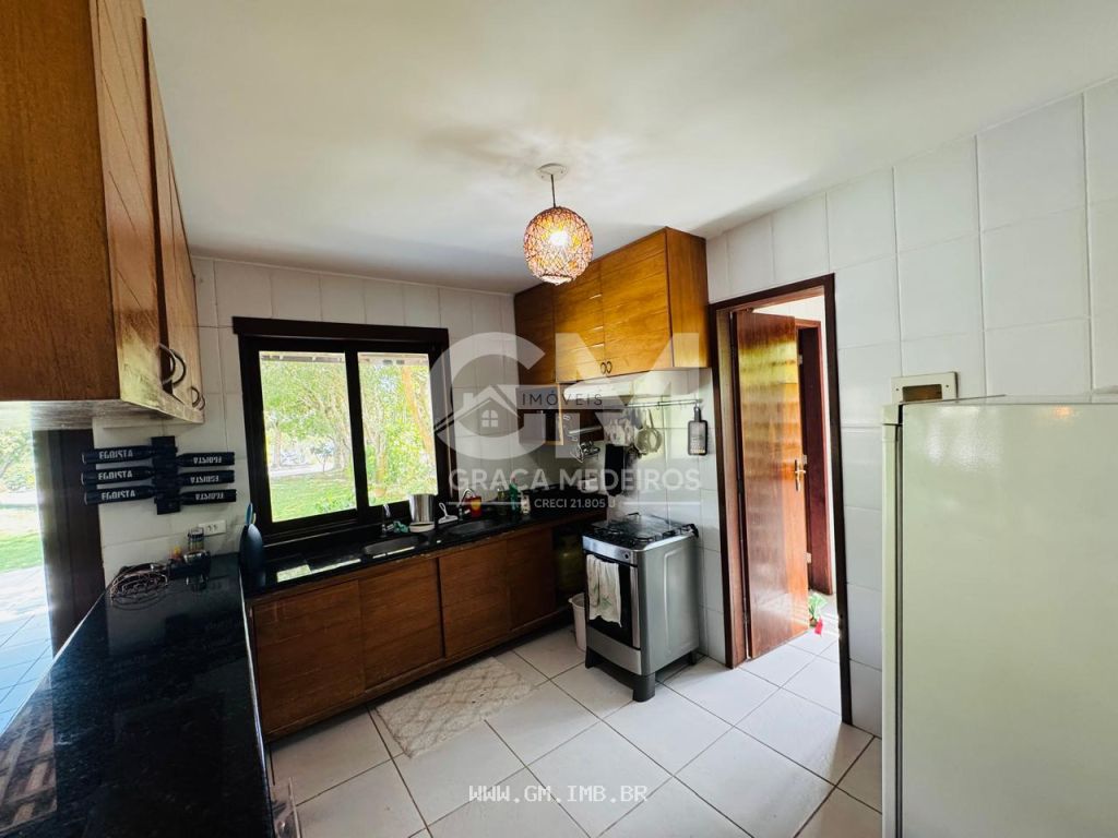 Foto de Casa exclusiva em condomínio com lago ás margens da BR 232