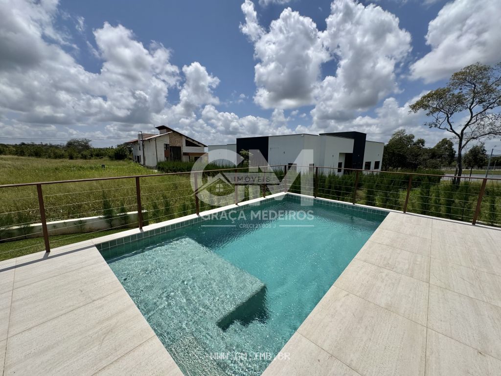 Foto de Casa de alto padrão, 4 suítes, piscina e terraço gourmet 