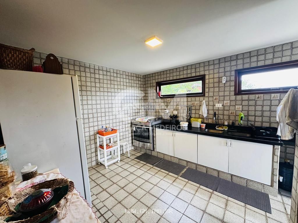 Foto de Casa com 7 quartos em condomínio fechado