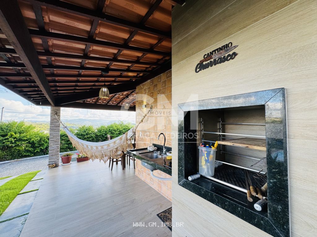 Foto de Casa térrea em condomínio com terraço gourmet