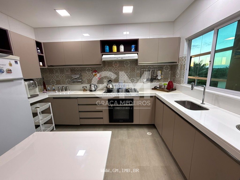Foto de Casa com 500 metros de área construída de alto padrão em condomínio 